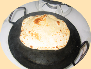  roti being cooked