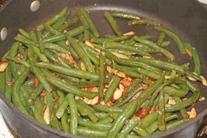 greenbeans cooking with almonds